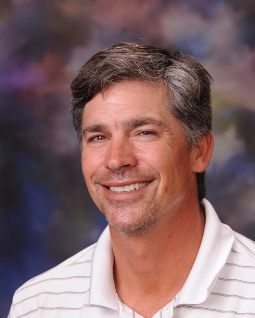 Huntington golf coach Mike Marinello.