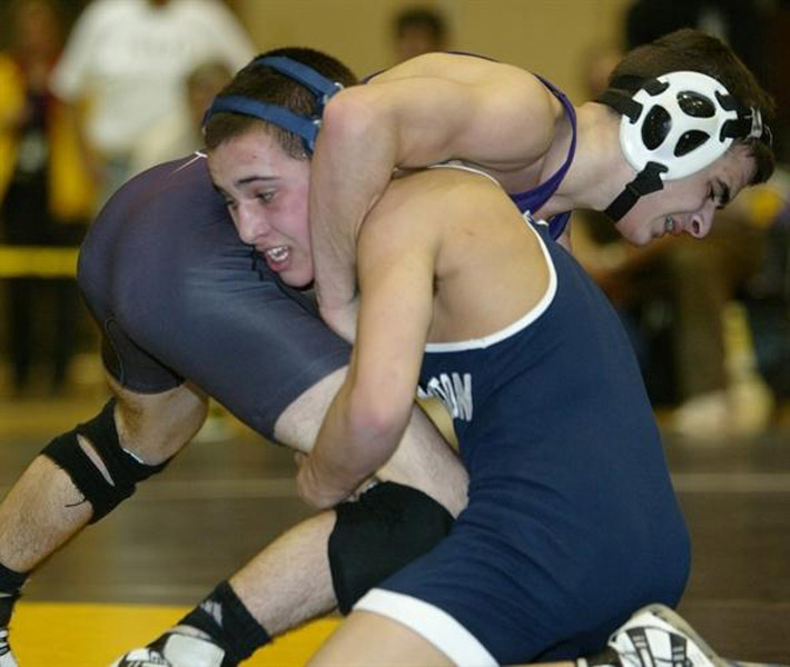 Justin Giani (right) on the mat
