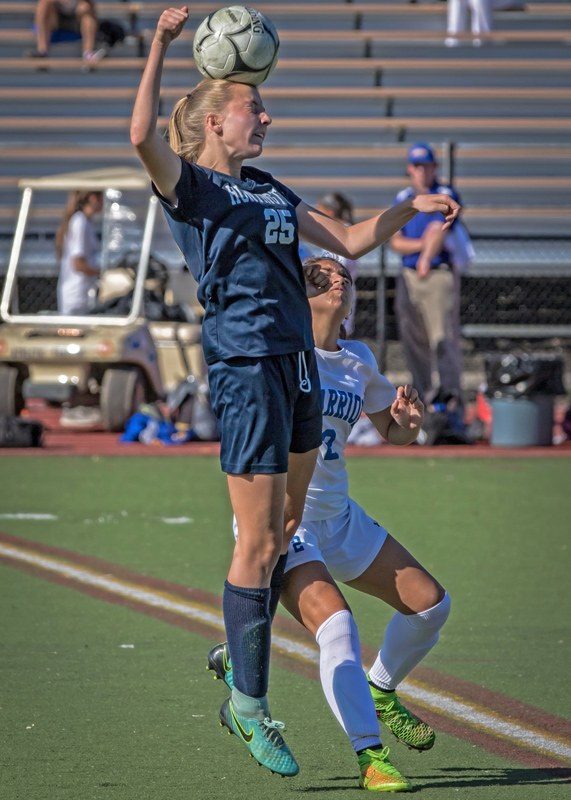 Grace Connell balances the ball on her head. (Mike Connell photo.)