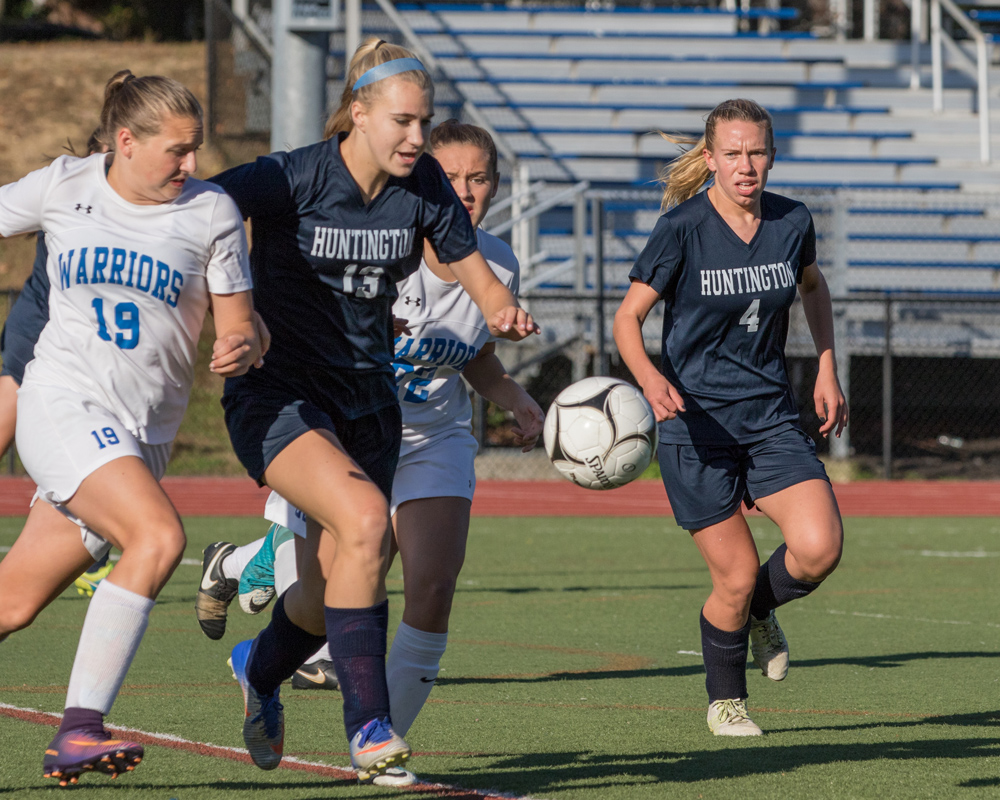 Katie Seccafico (No. 13) races after the ball. (Mike Connell photo.)