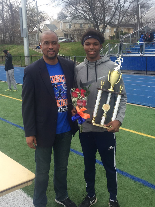 Kyree Johnson with Olympic gold medalist Derrick Adkins