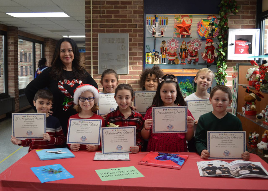 Jefferson Principal Valerie Capitulo-Saide with PTA Reflections program participants.