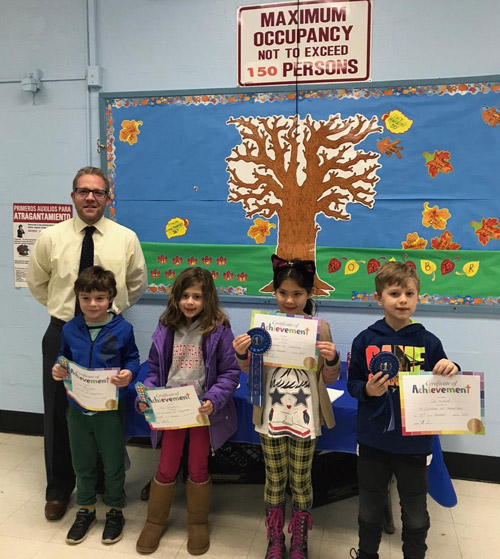 Southdown Principal Scott Oshrin with PTA Reflections contest award recipients.