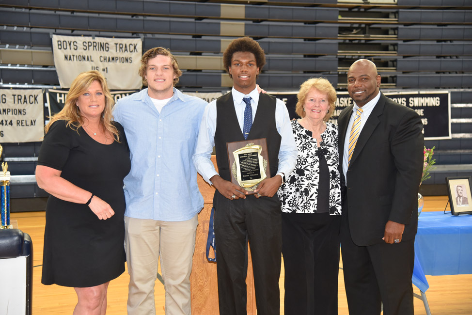 Kyree Johnson and Coach Ron Wilson with Deren family members.