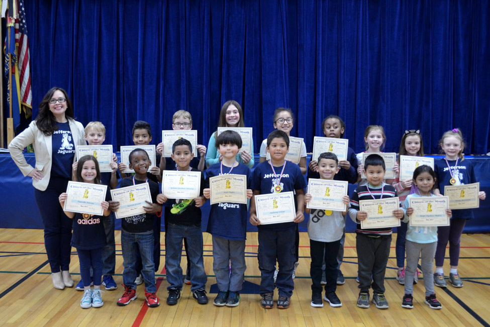 Jefferson Principal Valerie Capitulo-Saide with May's Citizens of the Month
