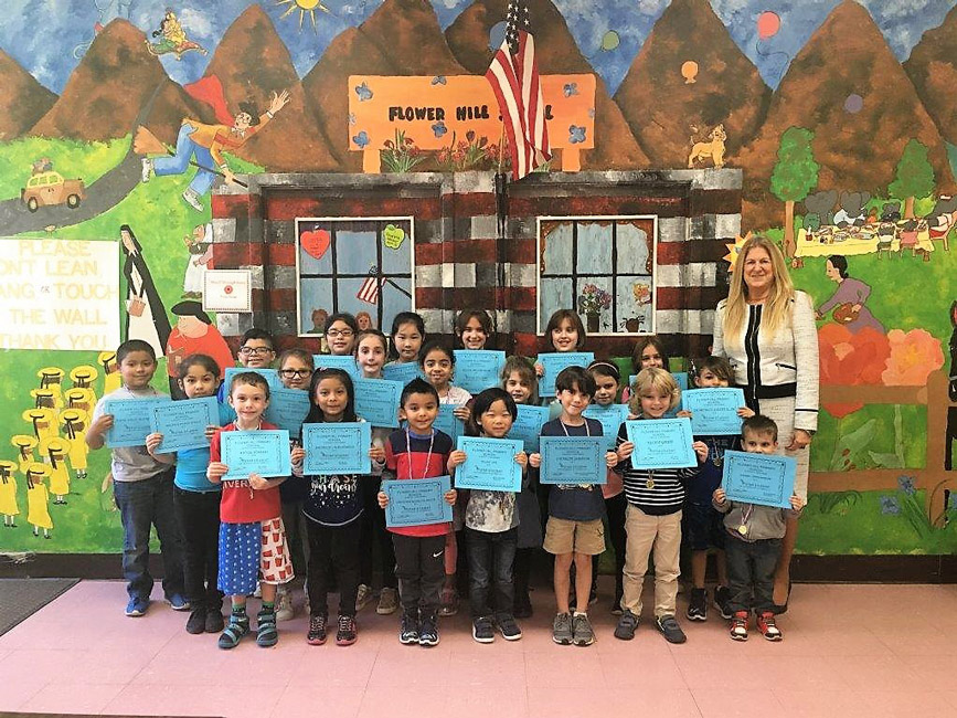 Flower Hill Interim Principal Paula Nickerson with October's Star Students.