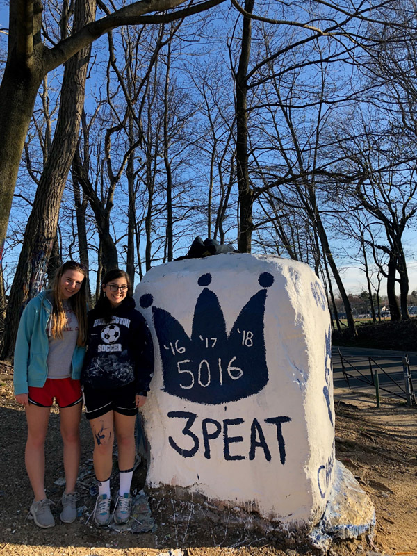 Lindsay Saginaw (left) with classmate and fellow robotics team member Bella McGinniss.