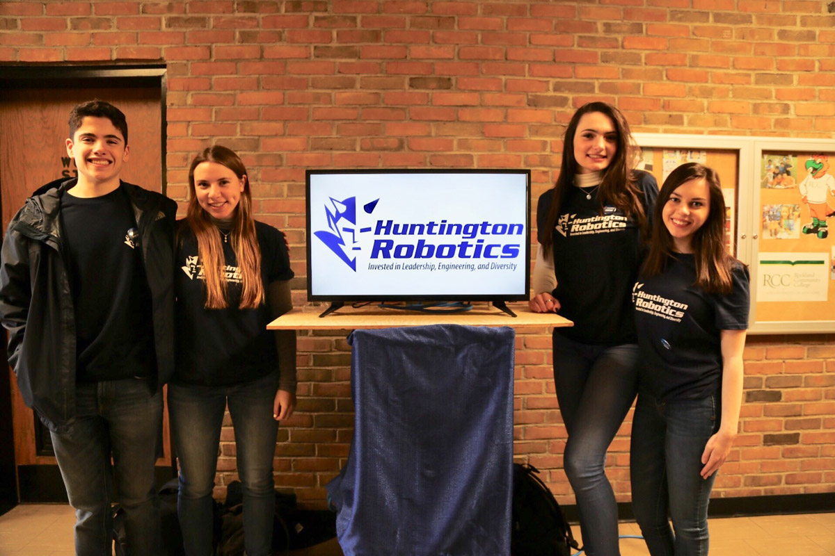 Lindsay Saginaw (second from left) with fellow Huntington Robotics team members.