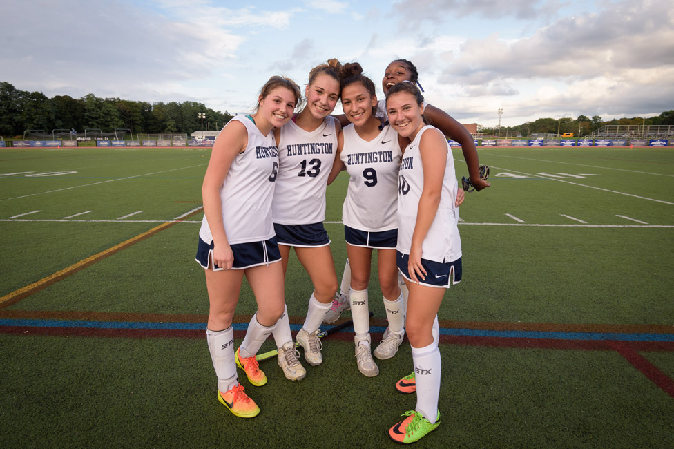 Phoebe Walther (right) with some of her field hockey teammates. (Darin Reed photo.)