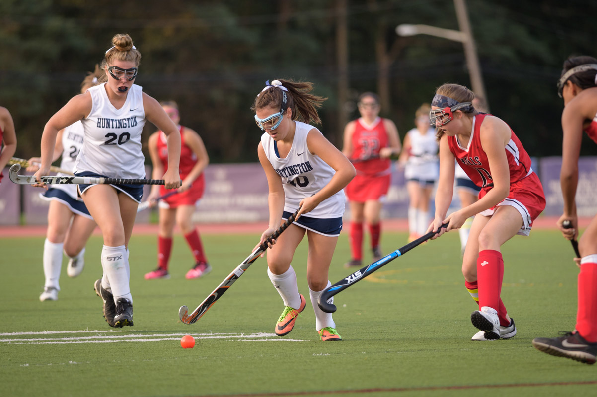 Huntington senior Phoebe Walther has the ball. (Darin Reed photo.)