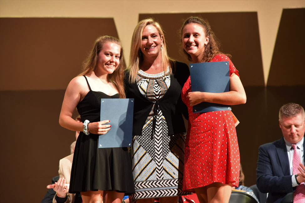 Lara Pettit Breingan is flanked by Pettit Scholarship Award recipients Erika Varady and Alyssa Sorensen.