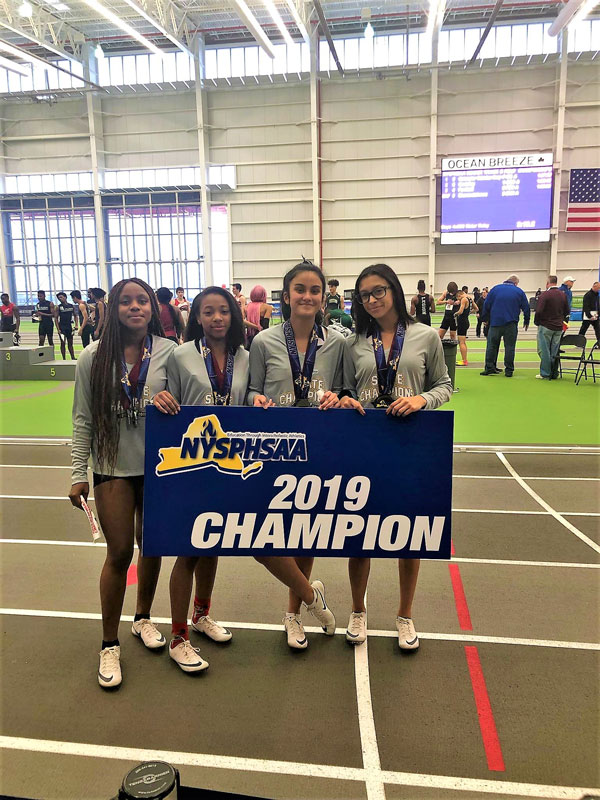 The Blue Devil girls' 4x200m relay state championship team.