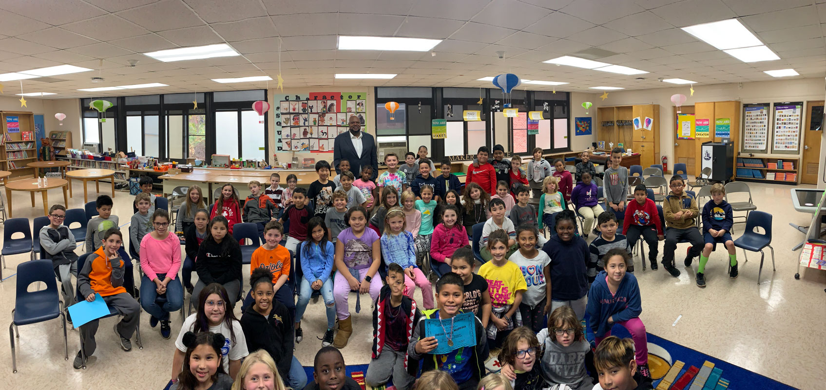 Former NFL player Gary Brown really connected with Flower Hill School's second and third graders.