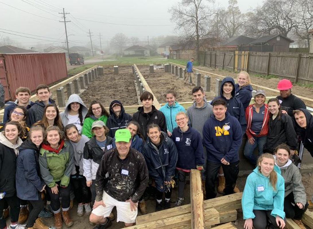 Charlie O'Rourke (top row left) with Habitat for Humanity in New Orleans.