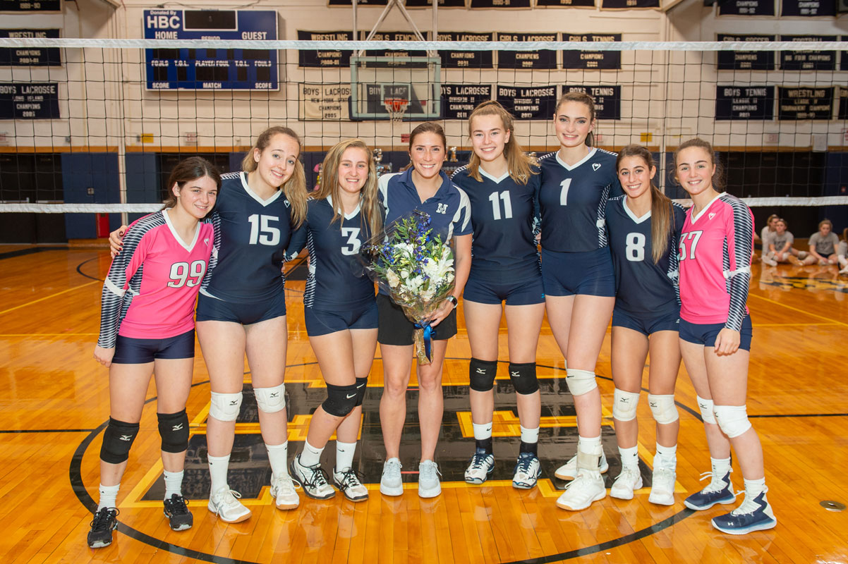 Maddie Reed (fourth from lest) with her fellow volleyball seniors and Coach Lauren Visbal. (Darin Reed photo.)