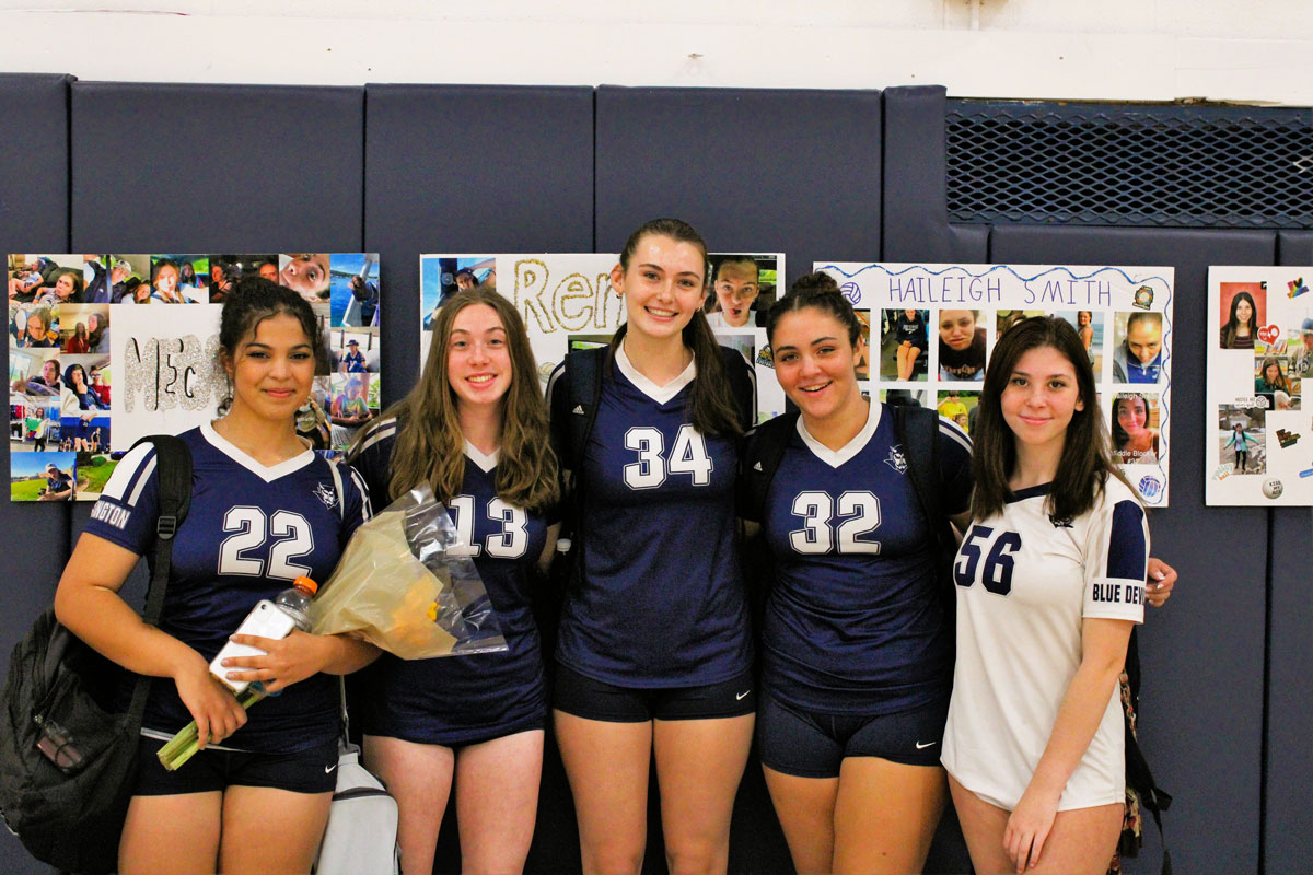 The Huntington girls' volleyball team's five seniors are spectacular. (Victoria Befumo photo.)