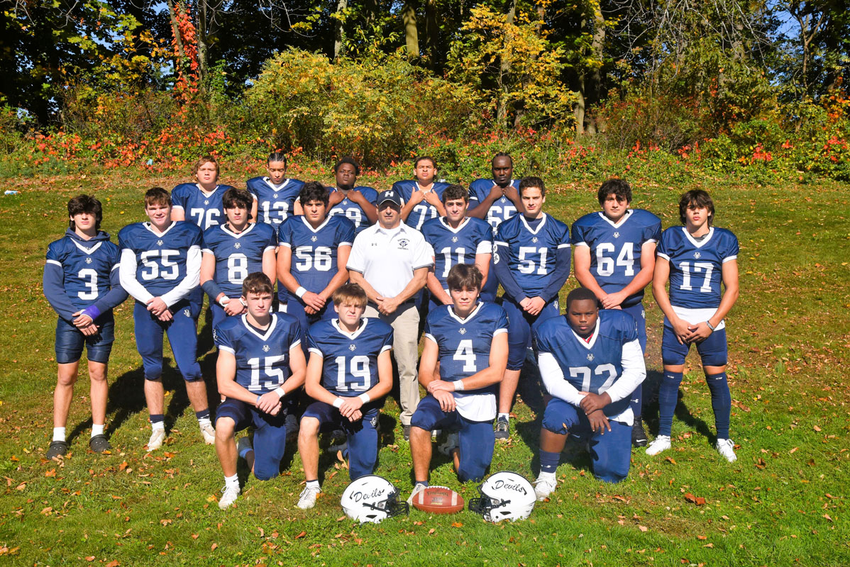 The Huntington football teams 2022 senior with head coach Steven Muller.