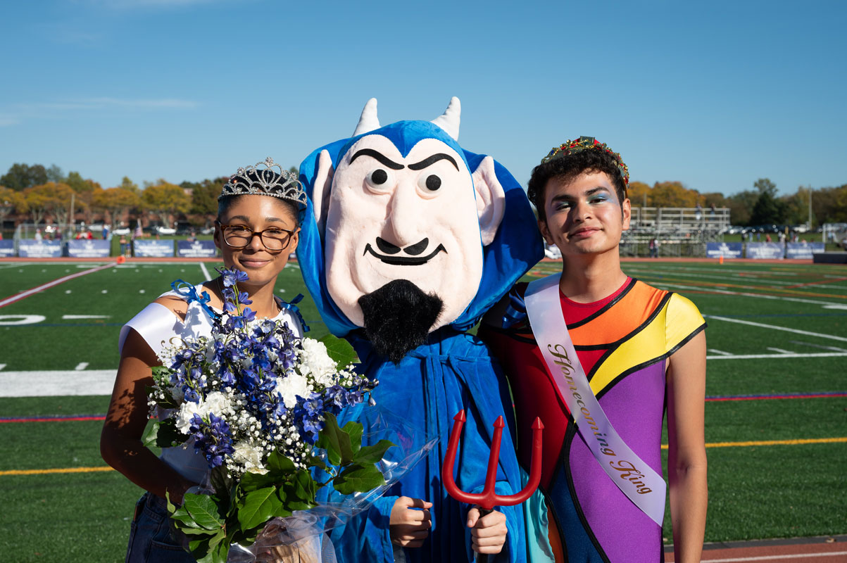  Homecoming Day Queen Hope Bilkey and King David Chavez-Hernandez with Mr. Blue Devil (Darin Reed photo.) 