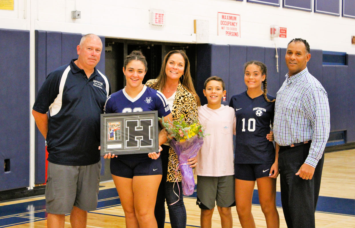 Hailey Smith with Coach Todd Donaghy and her family. (Victoria Befumo photo.)