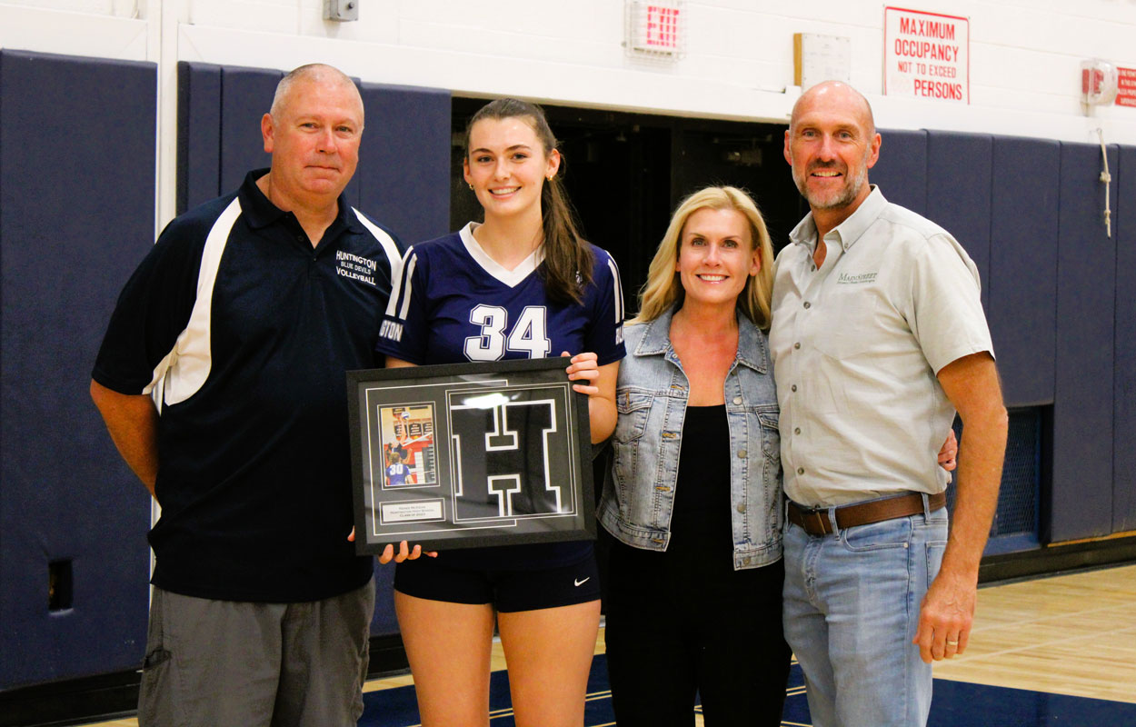 Renee McKean with Coach Todd Donaghy and her parents. (Victoria Befumo photos.)