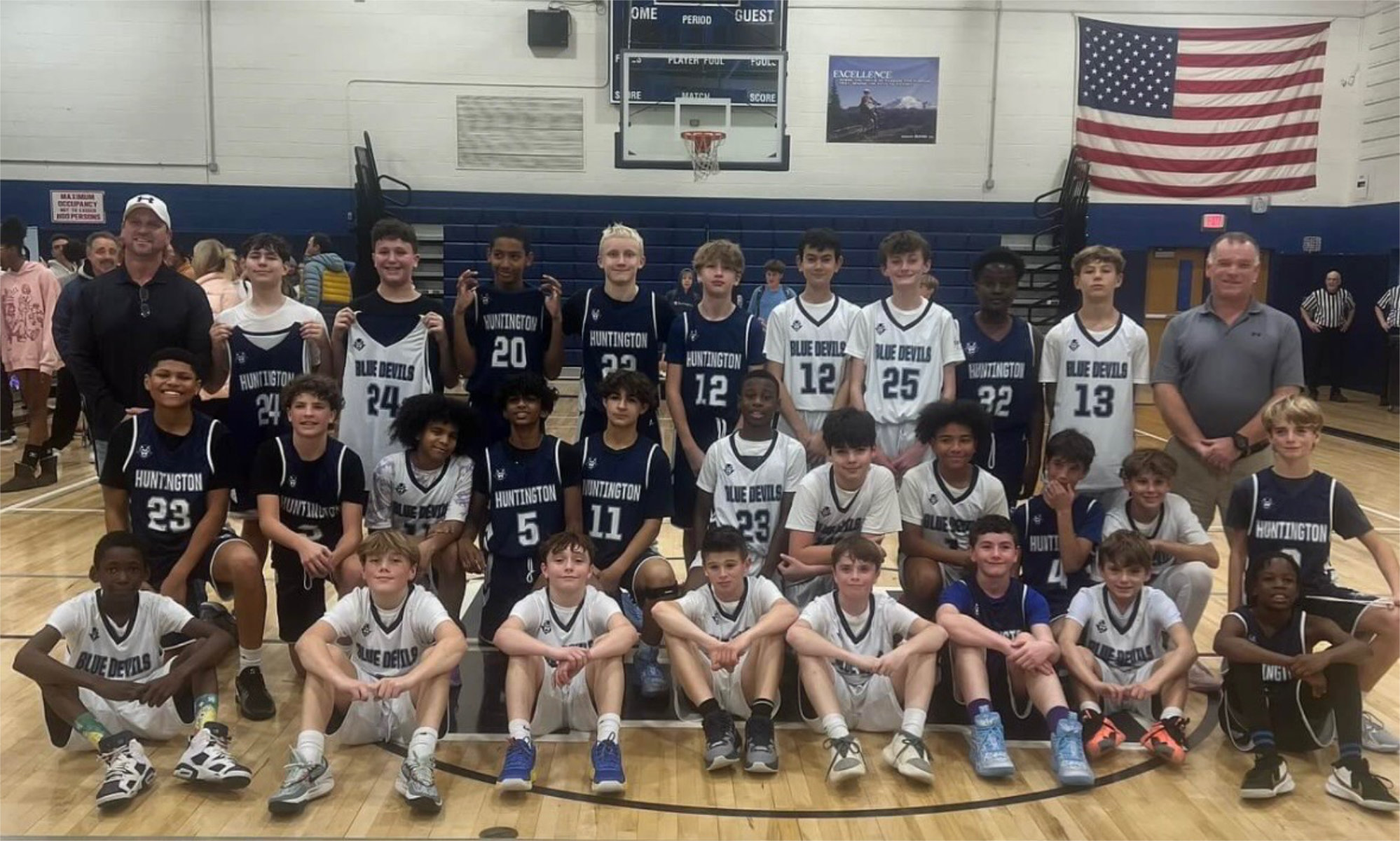  The Finley Blue and White boys' basketball team with coaches Timothy Madden and John Walsh.