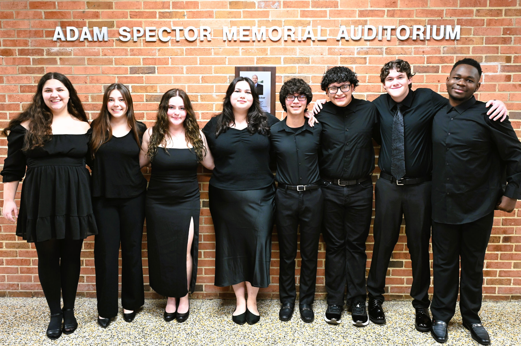  Huntington High School chamber choir members performed at the Huntington School Board meeting./