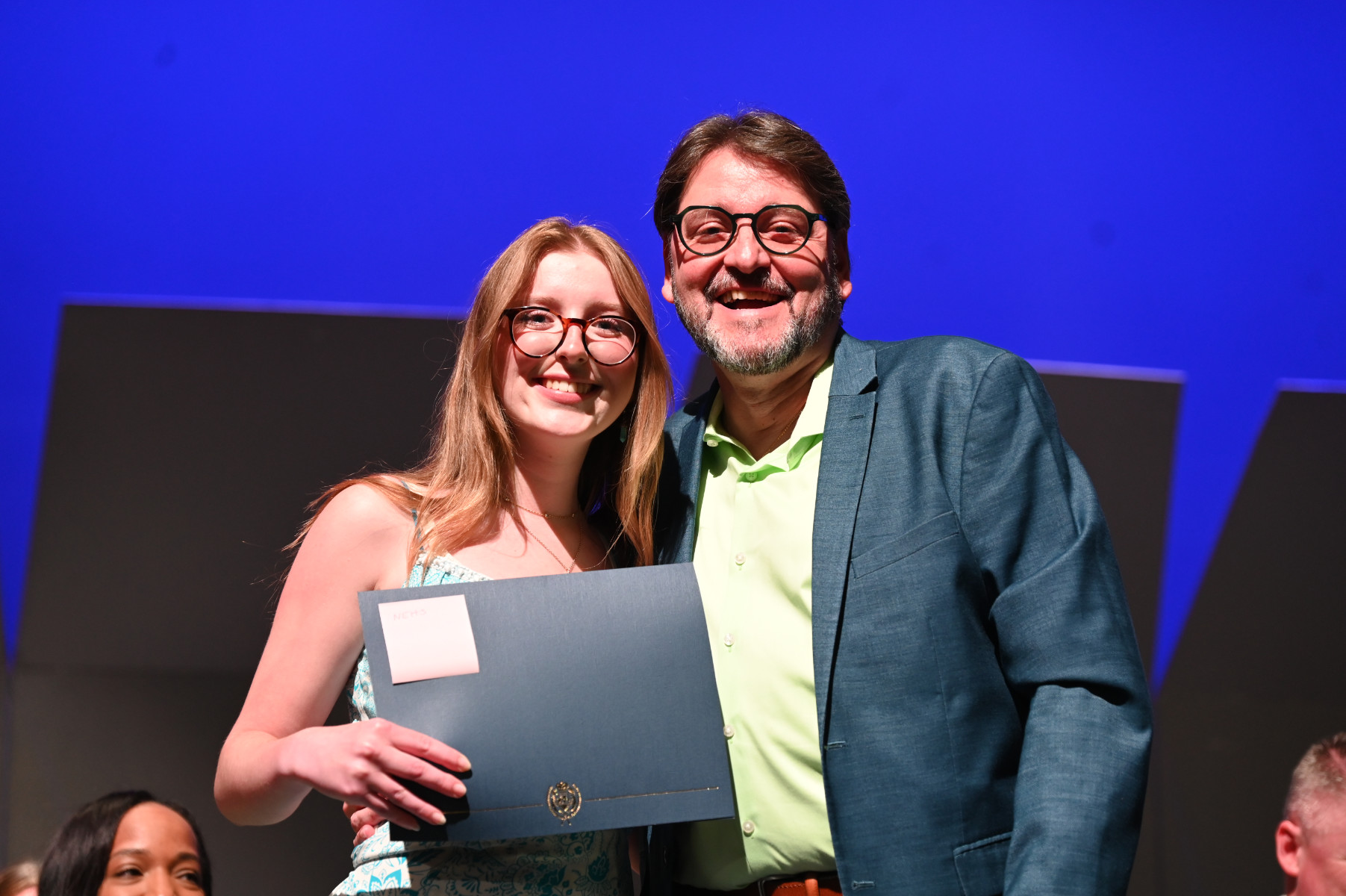   Lily Tierney with high school English teacher Michael Schwendemann (1) 