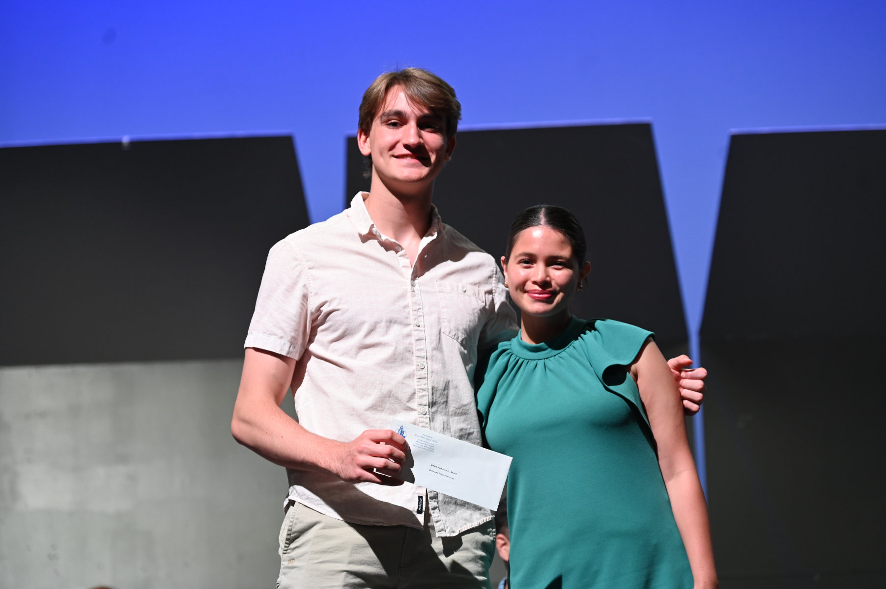  Benjamin Edgar-McNerney was presented the Robert Buchanan Award by guidance counselor Ivy Alvayero   