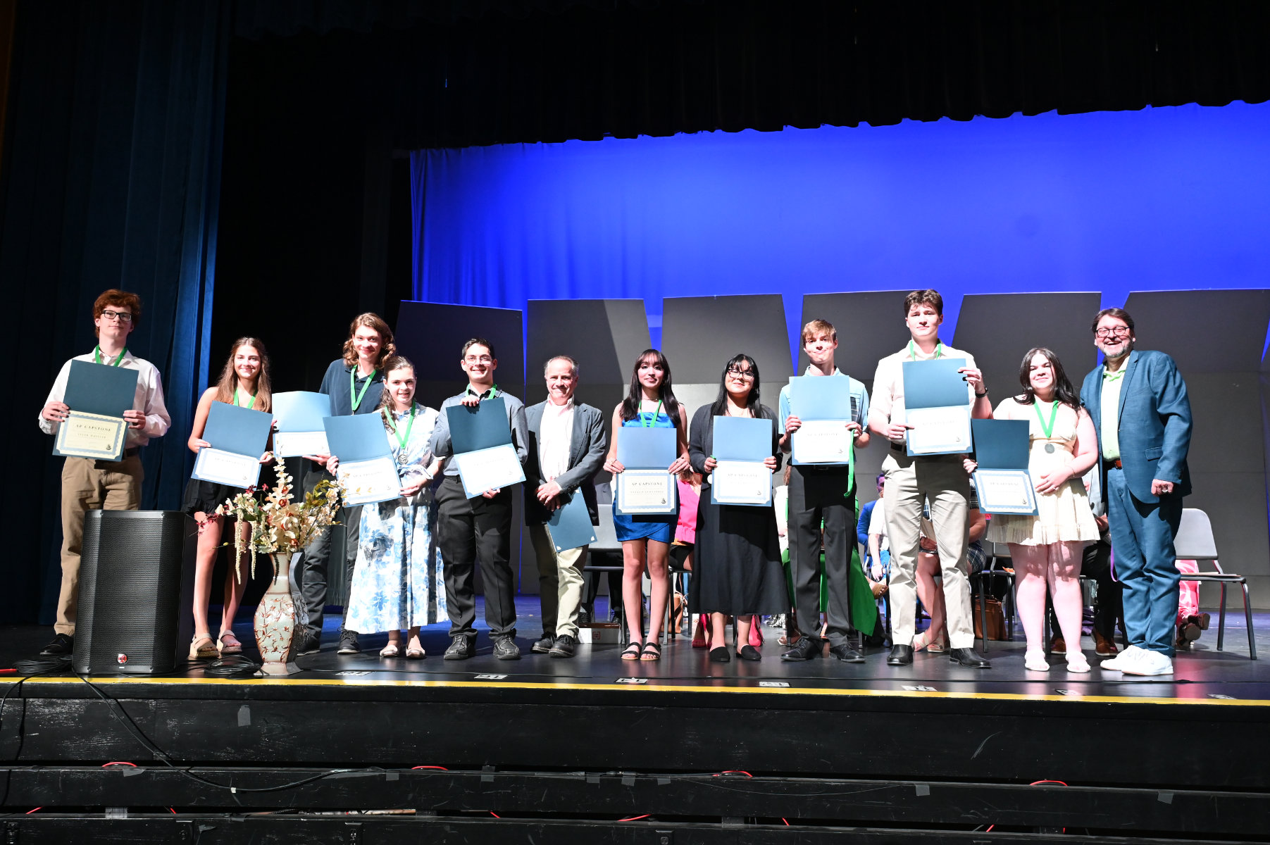  Advanced Placement Capstone Award recipients on the Huntington High School stage.  