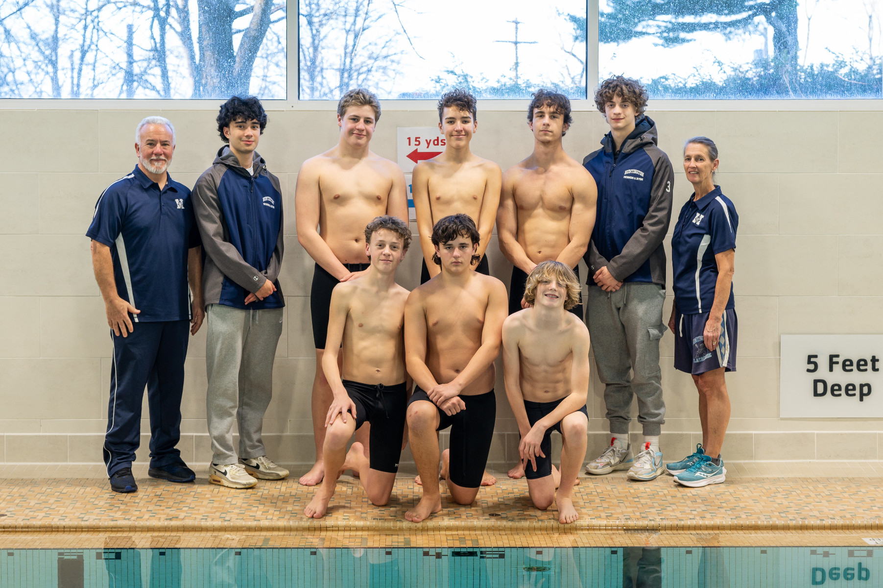  Huntington's swimmers and coaches are formidable. (Rachel Learned photo.)  