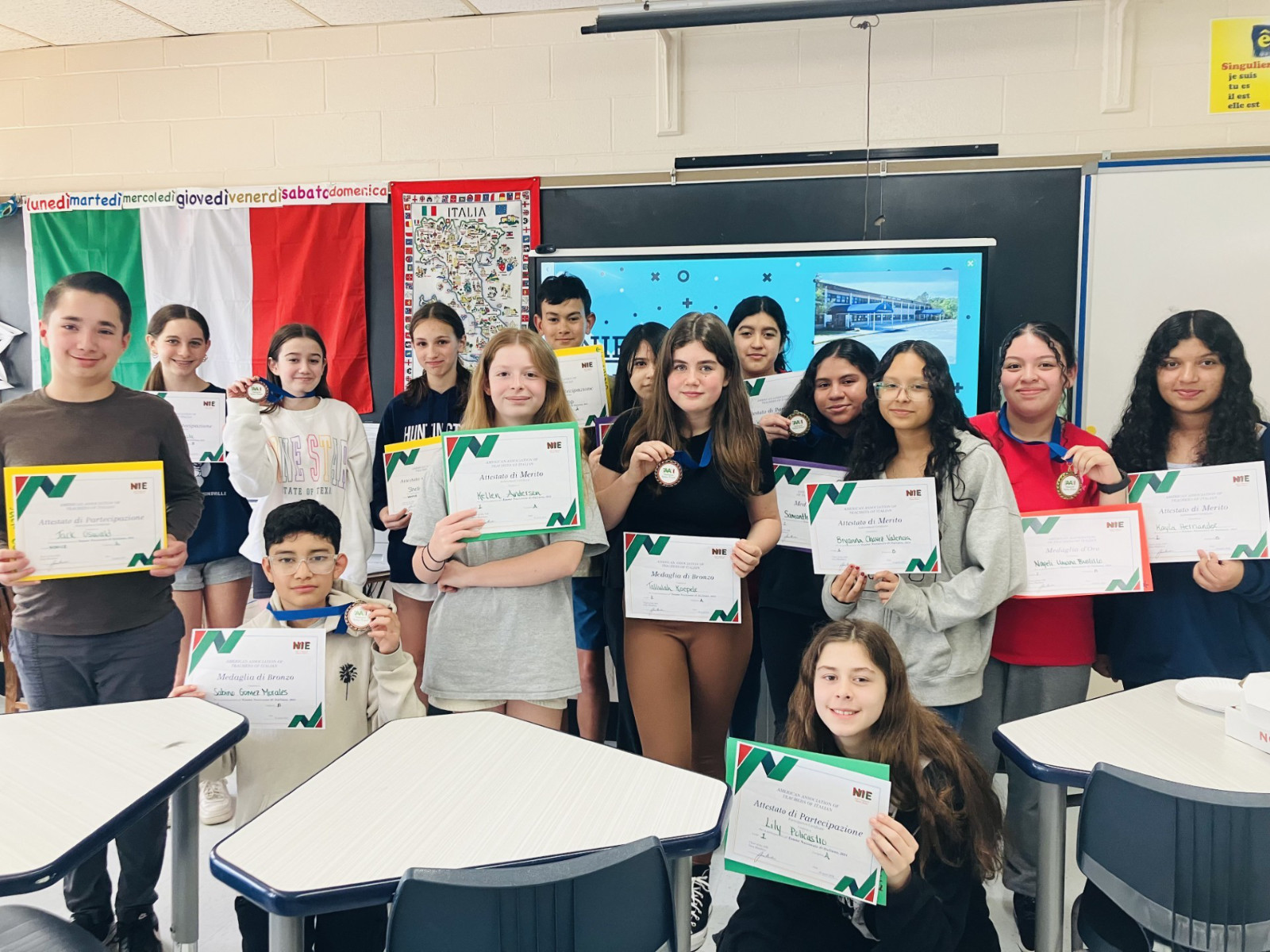  National Italian Exam participants (standing from left) Jack Oswald, Caleigh Camarata, Angelica Cunningham, Shelby Meystrik, Kellen Anderson, Steven Lapp, Haley Veliz Guardado, Tallulah Koepele, Katerin Reyes, Samantha Jimenez Acosta, Bryanna Chavez, Nayeli Umana Bustillo, Kayla Hernandez (kneeling from left) Sabino Gomez Morale and Lily Policastro  