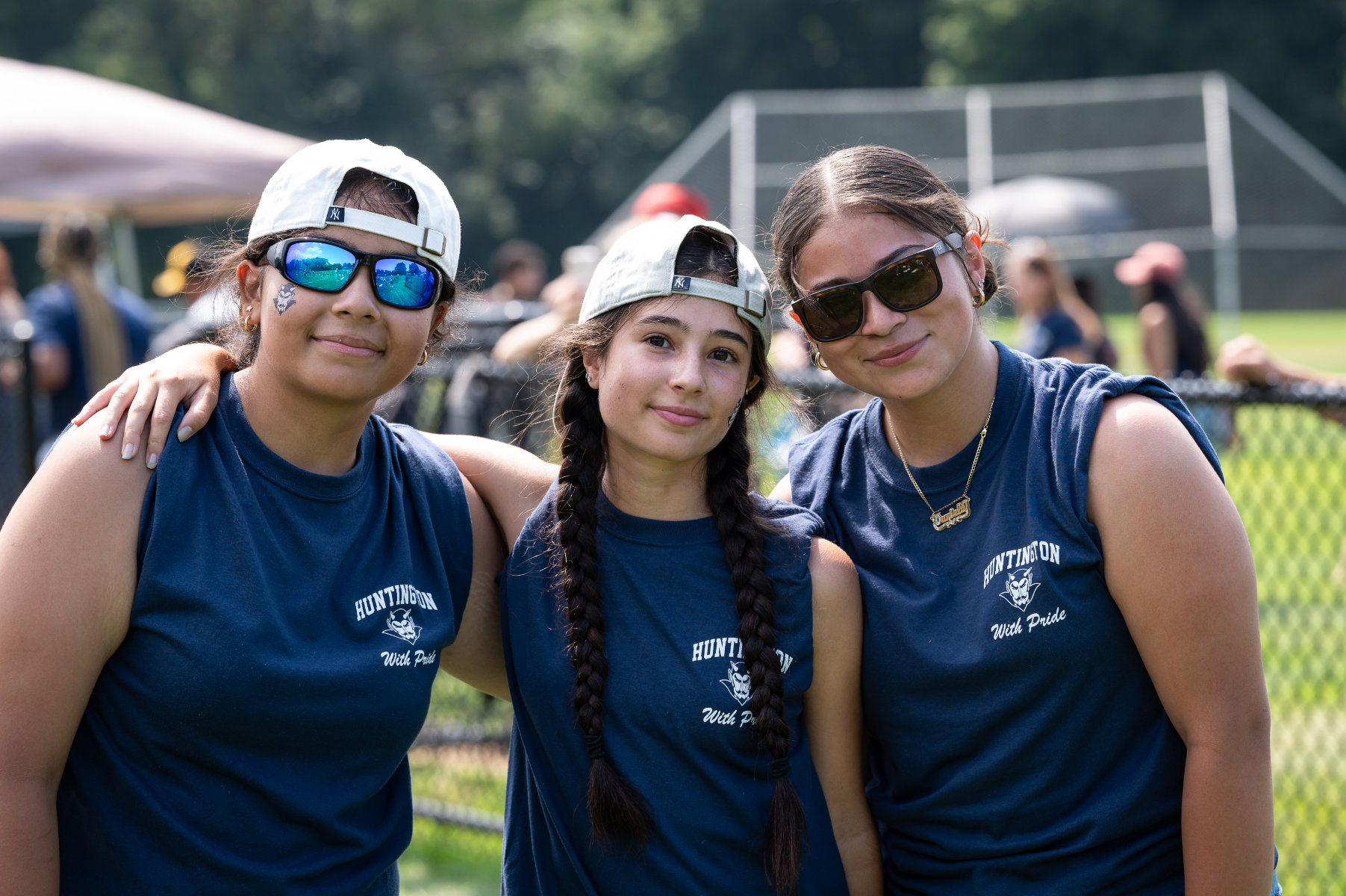  Charlie Cassatto is flanked by her marching band friends. (Darin Reed photo.)  