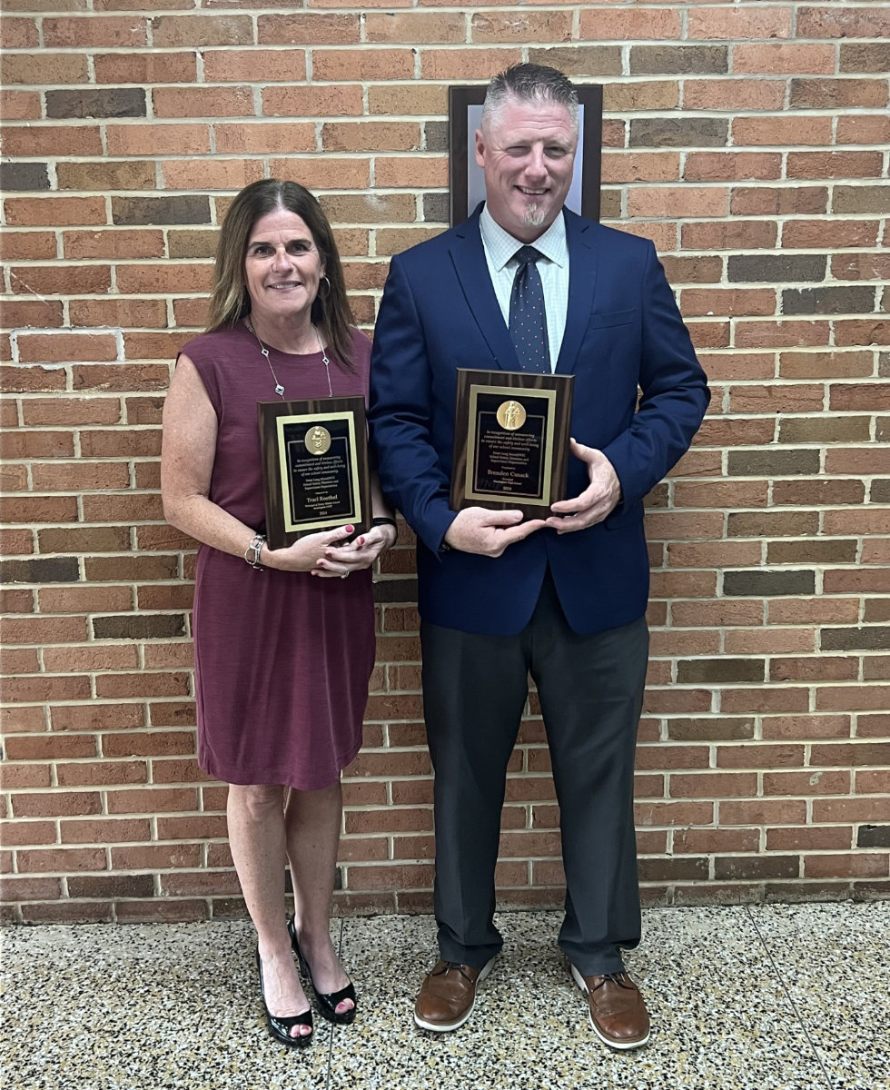  Traci Roethel and Brenden Cusack with school safety awards.  