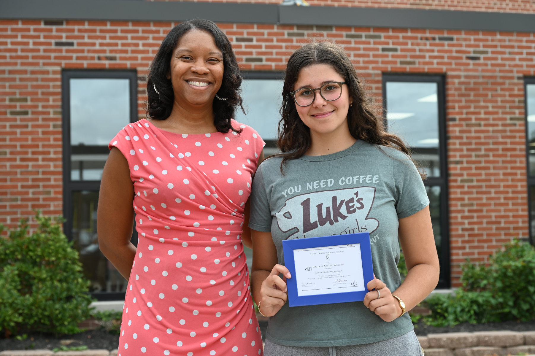  Huntington Principal Rochelle Brown and National Merit Commended senior Isabella Careccia-Johnson  