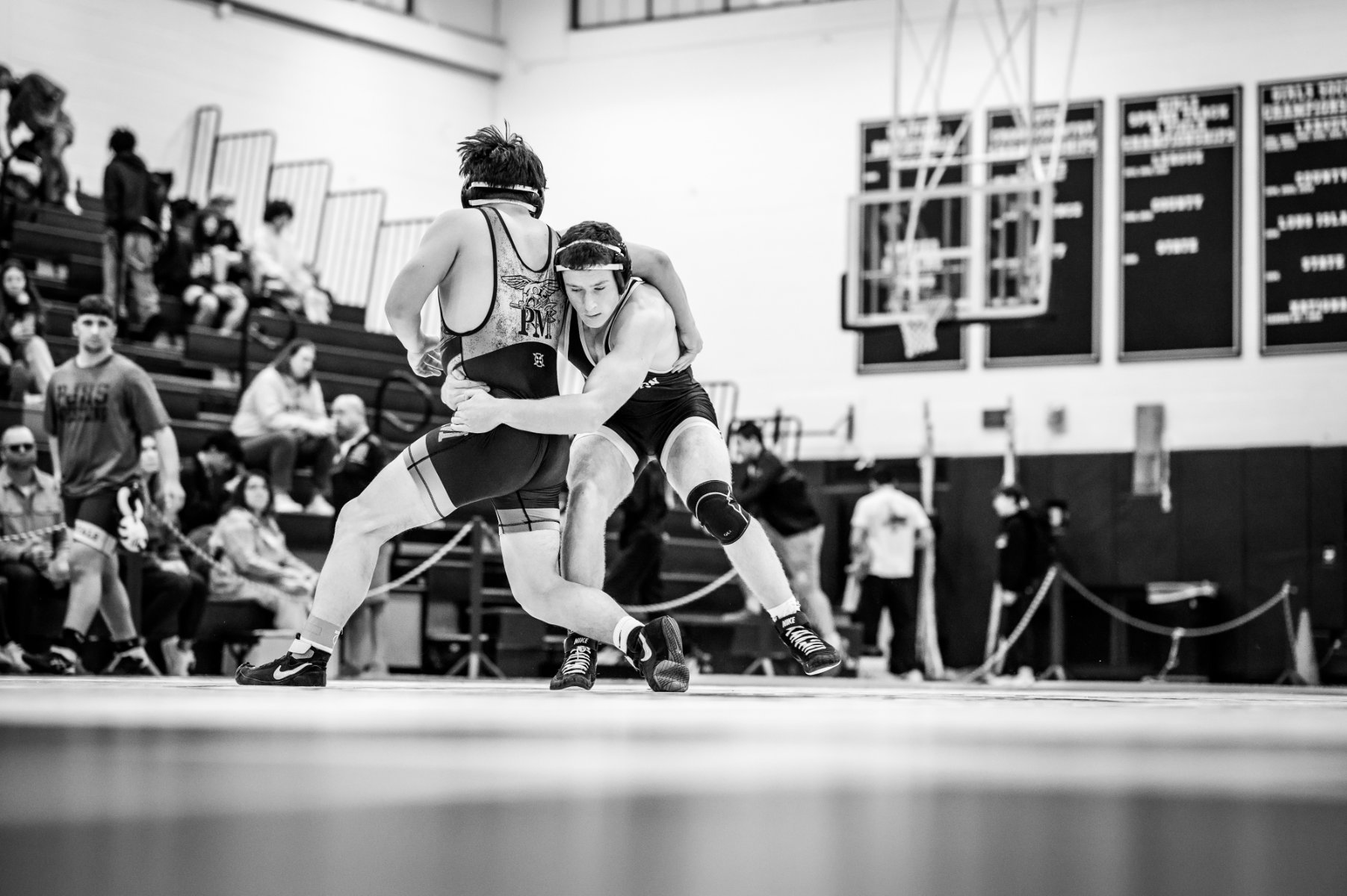  Huntington's Tom Smith (right) wrestled his way to first place at 190 lbs. (Darin Reed photo.) 