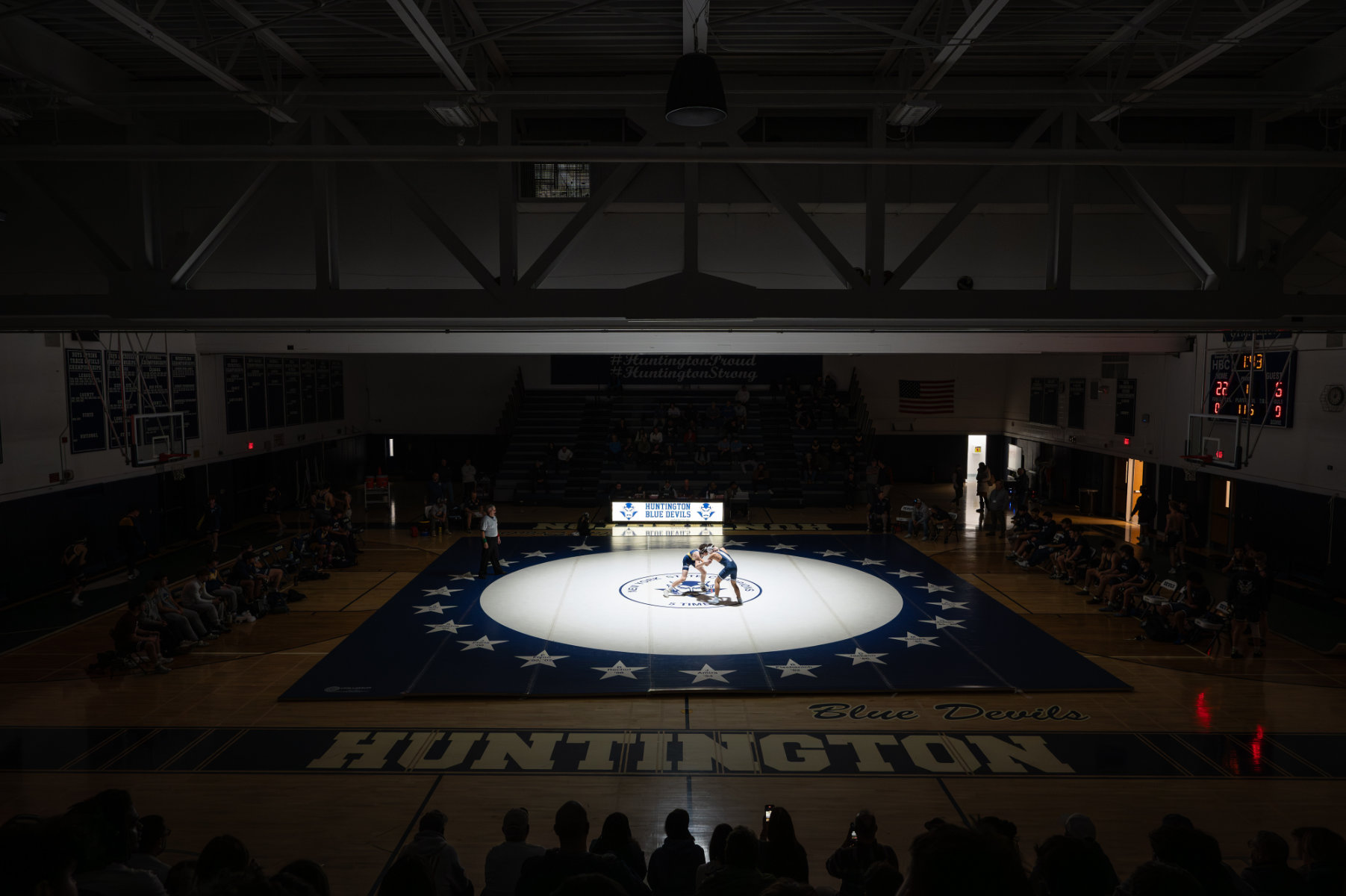  The Huntington wrestling team topped Northport under the Blue Devils' new mat lamp. (Darin Reed photo.) 