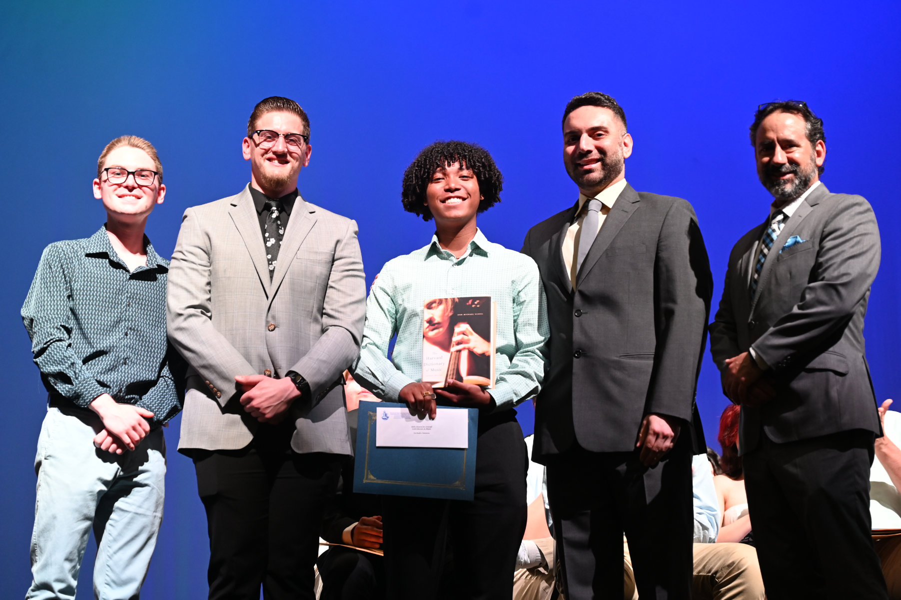 Ithaca College bound spectacular musician DeAndre Simmons with Huntington music teachers.