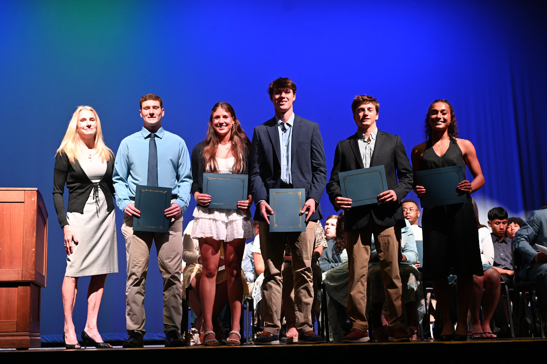 Lara Pettit Breingan with the T. Christopher Pettit Memorial Scholarship Award recipiets.