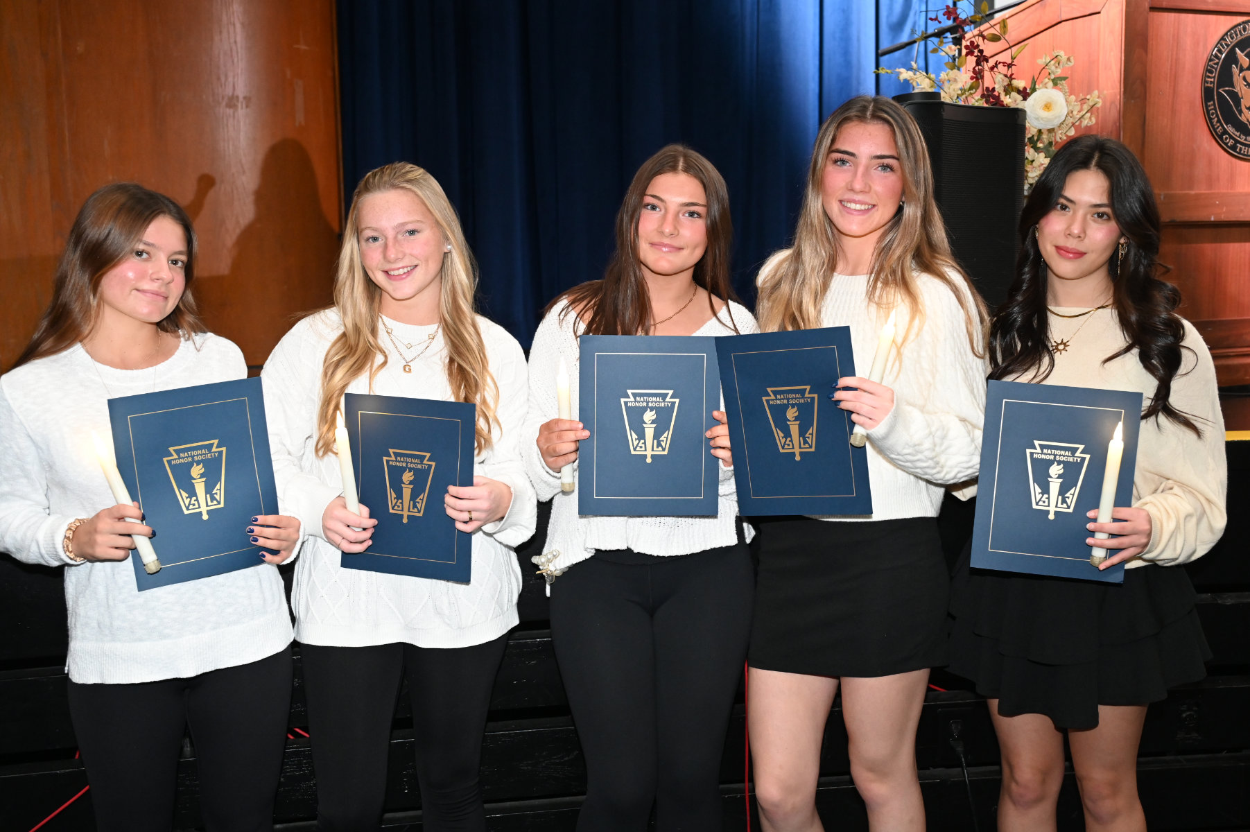 Huntington's National Honor Society chapter inducted more than 70 new members