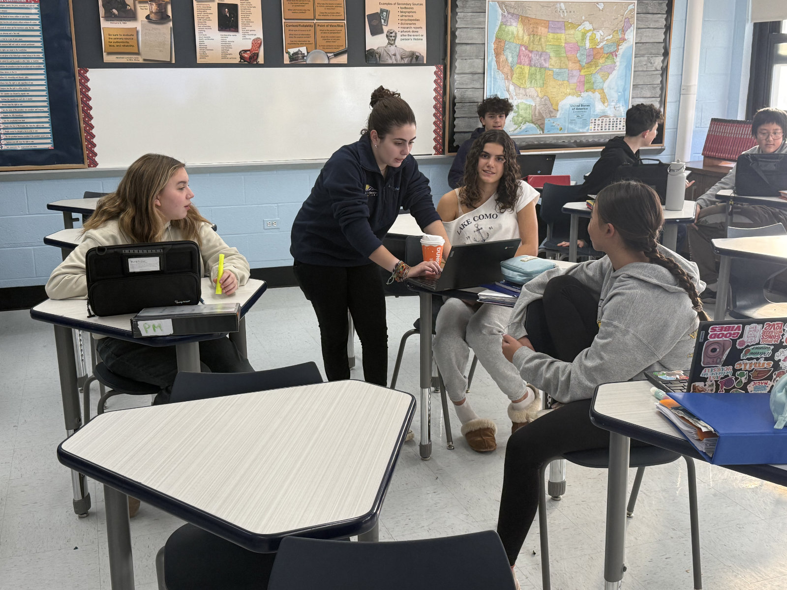 The National History Day officers worked with the Finley students on their projects 