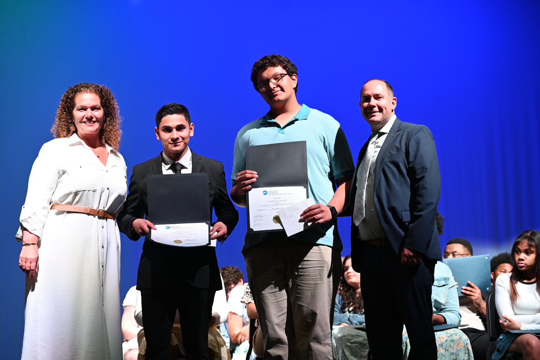 Beth McCoy and Chris Hender flank Jose Diaz Gomez and Toni Reyes-Sorto.