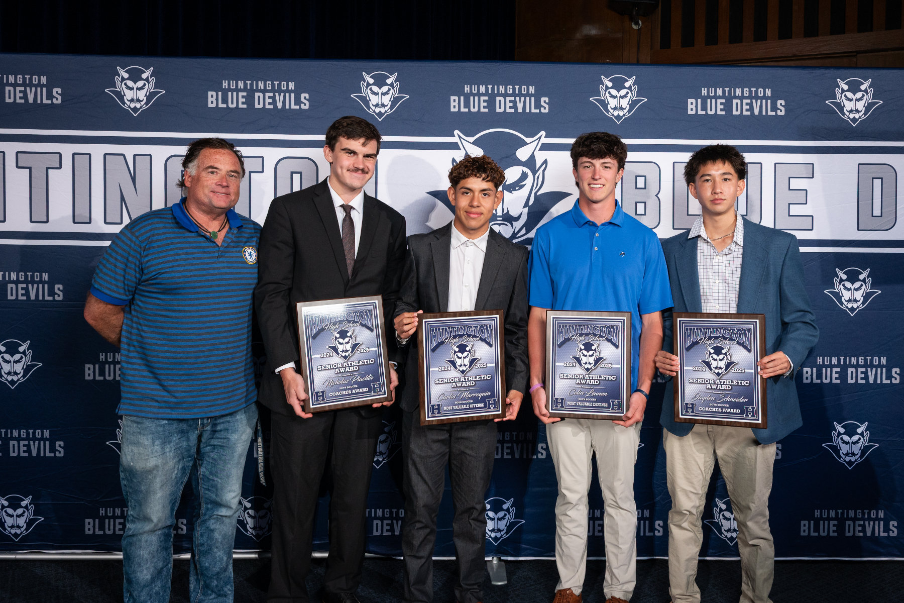 Huntington boys' soccer coach John Pagano with four senior award honorees. (Darin Reed photo.)