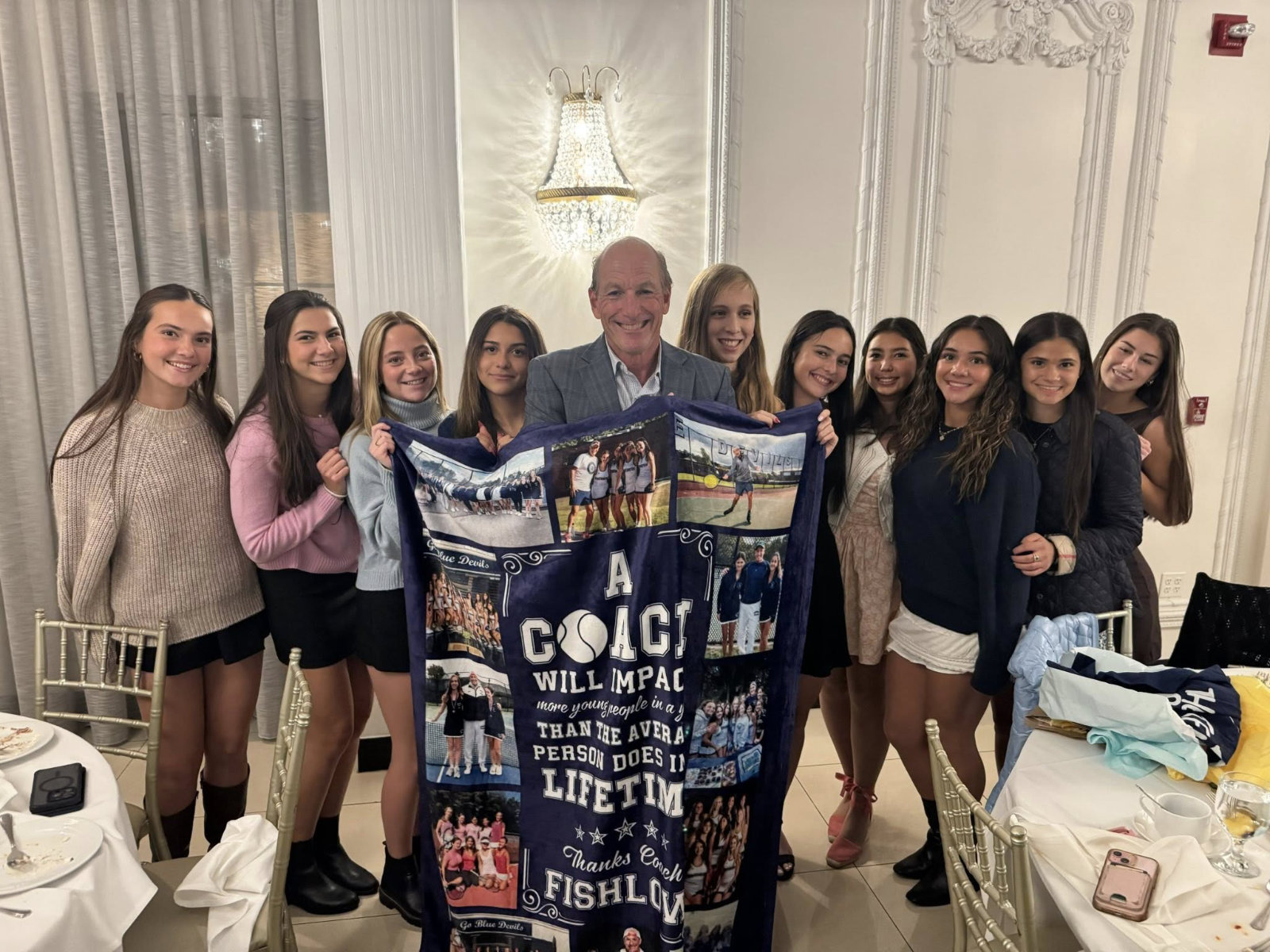 Coach Jamie Fishlow and the Huntington girls' tennis team at the county awards dinner. 