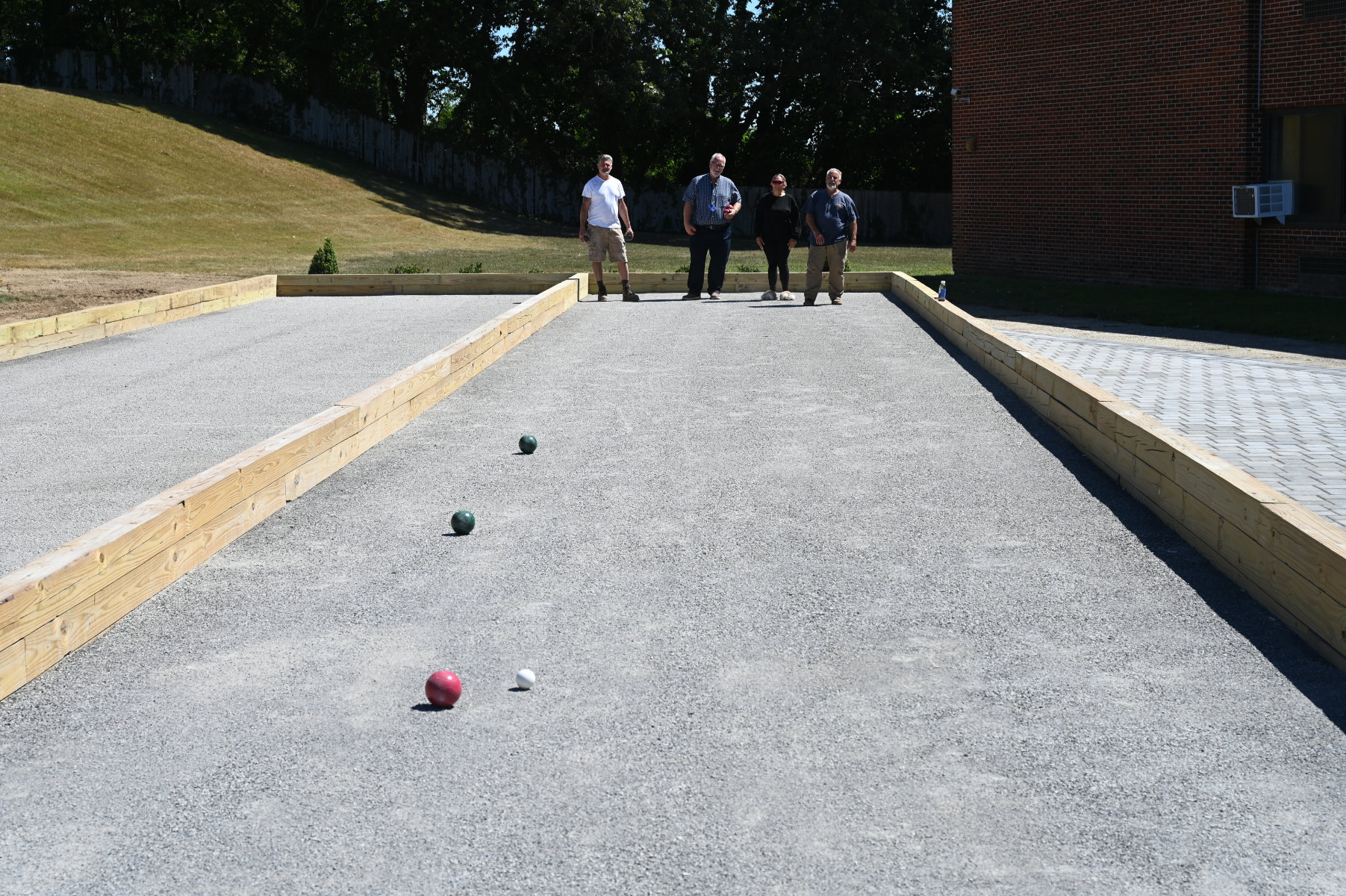  Facilities Dept. members who helped build the courts tested them out   