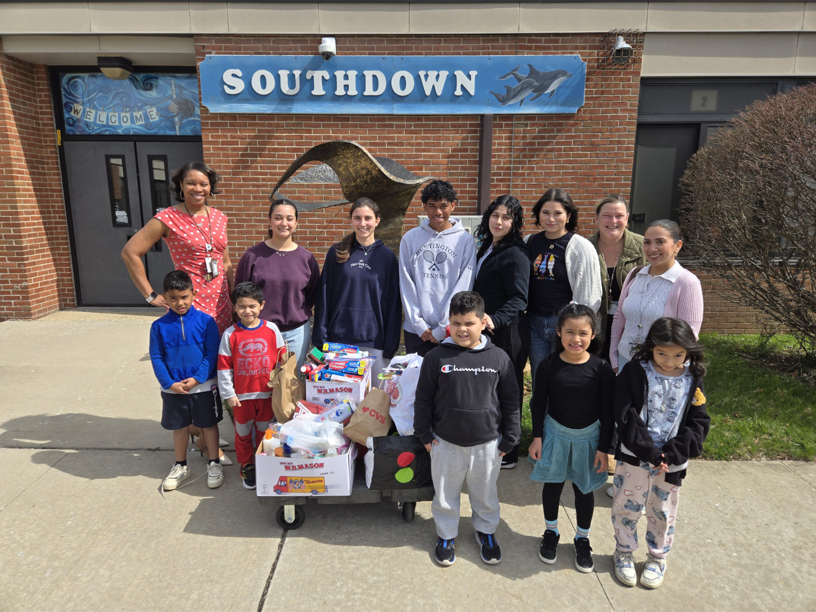  A Huntington High School contingent accepted donations to the Blue Market at Southdown.  