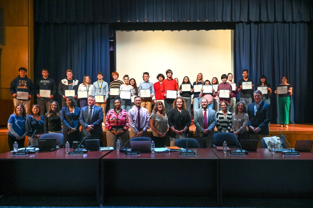  Huntington trustees, district officials, principals and student honorees at this week's  