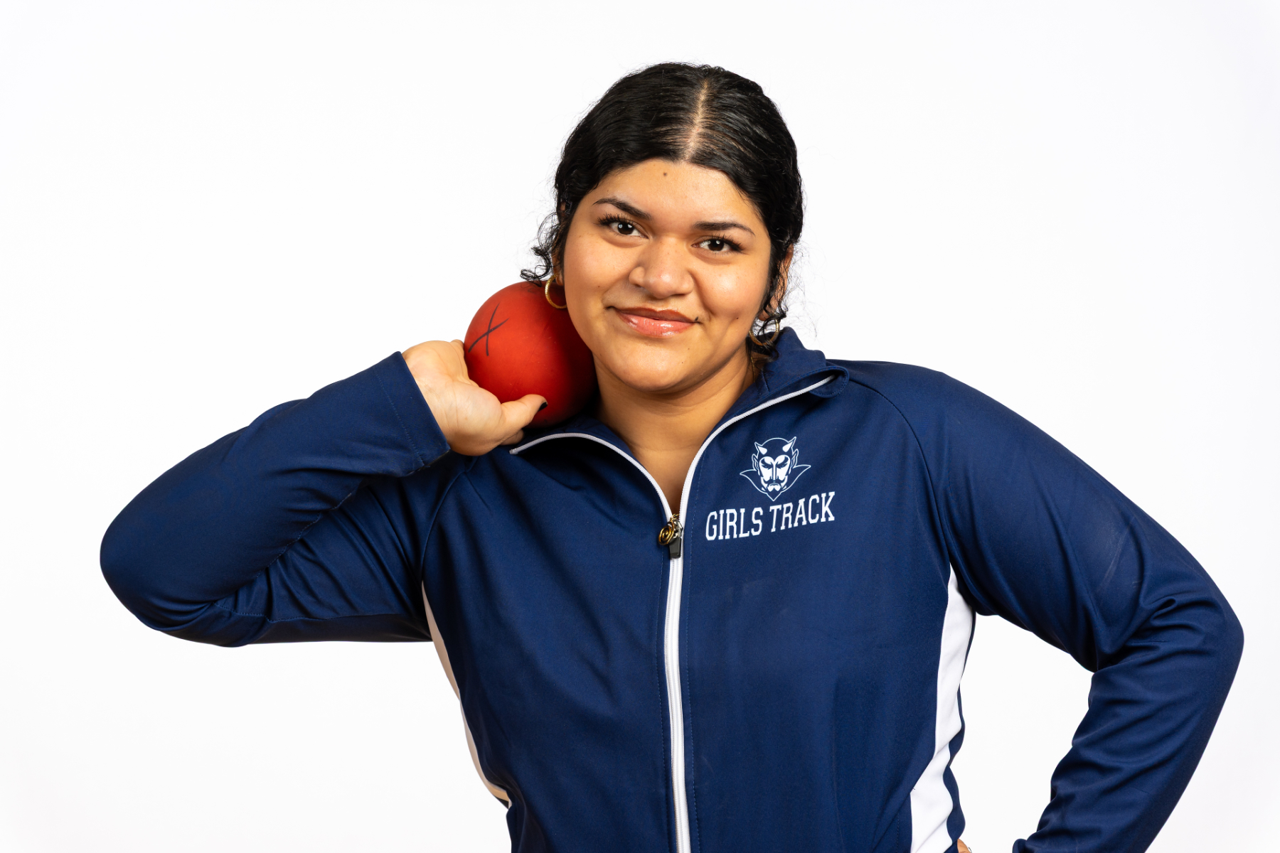  Jesley Martinez looks to peak in shot put at the state qualifier. (Darin Reed photo.)  
