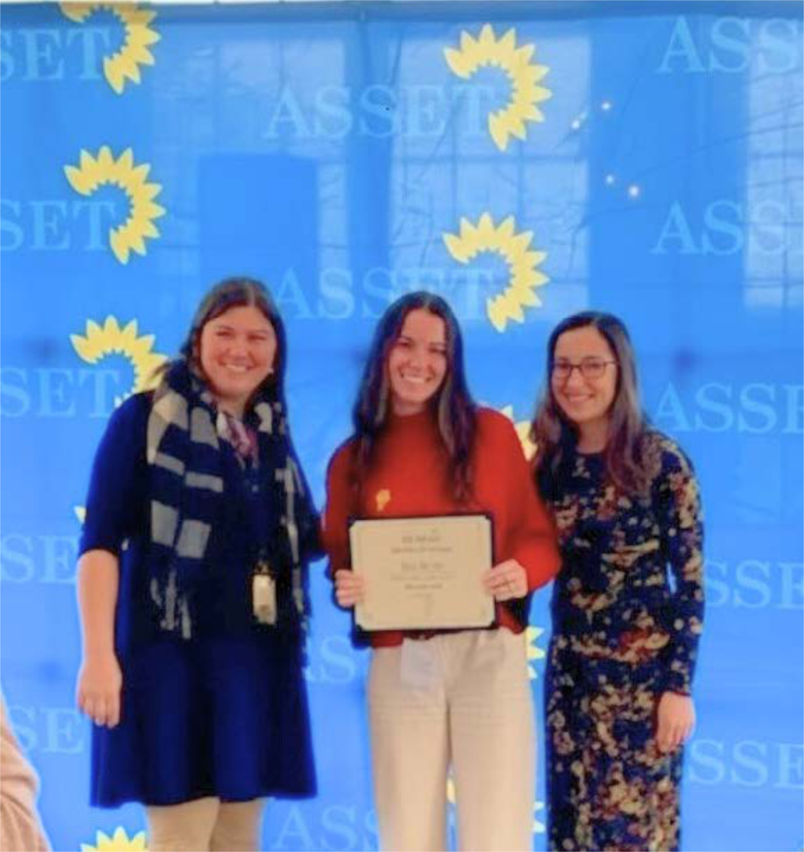  ASSET Bright Light Award Winner Jessica Martino (center) at the award ceremony.  