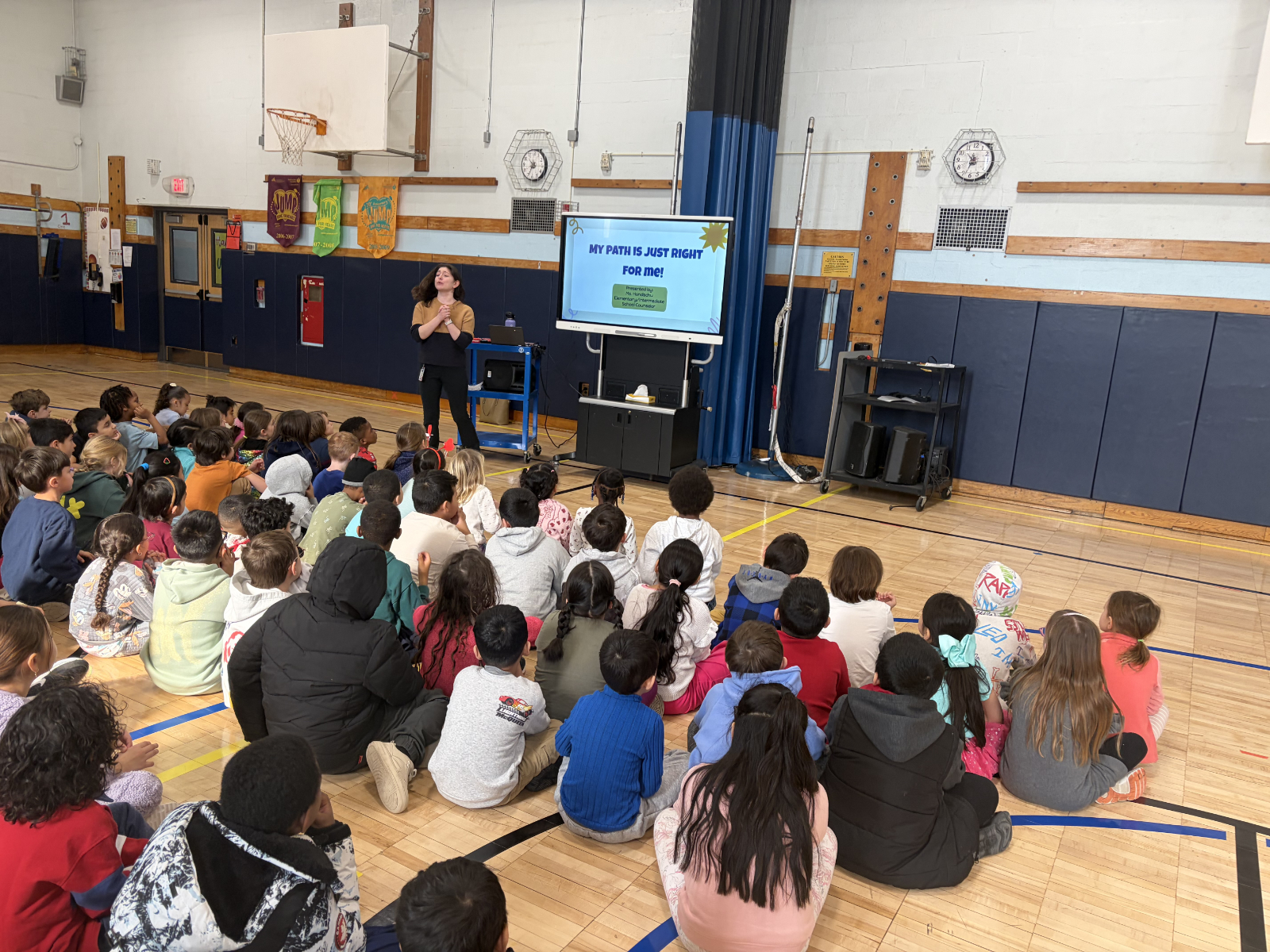  School counselor Michelle Handschu with Flower Hill students  