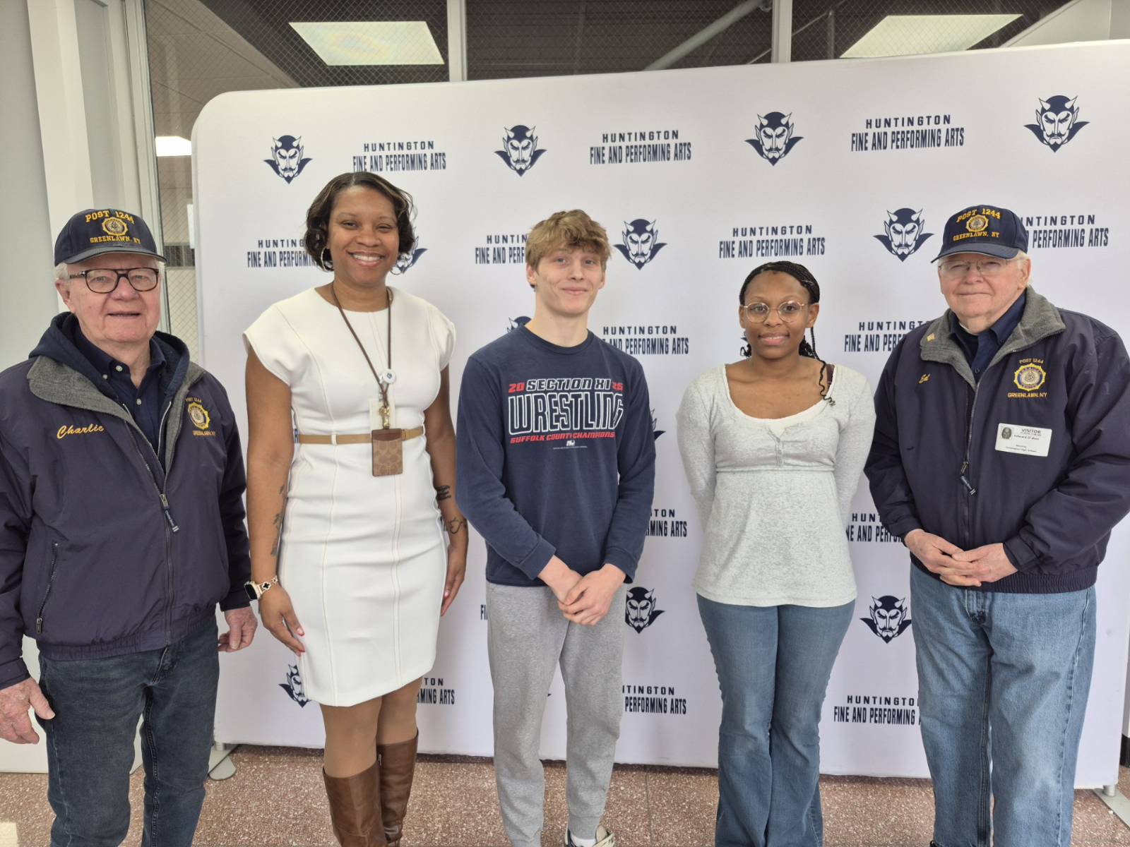 Melanie Freeman-Brown (second from right) with American Legion and Huntington High School officials.  
